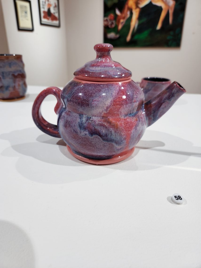 Annika Soderberg "Teapot" 2023. Stoneware, 8in. long x 5in. wide x 6in high. Part of the "2023 Bachelor of Fine Arts and Bachelor of Arts Exhibition," University of Southern Maine Art Gallery.