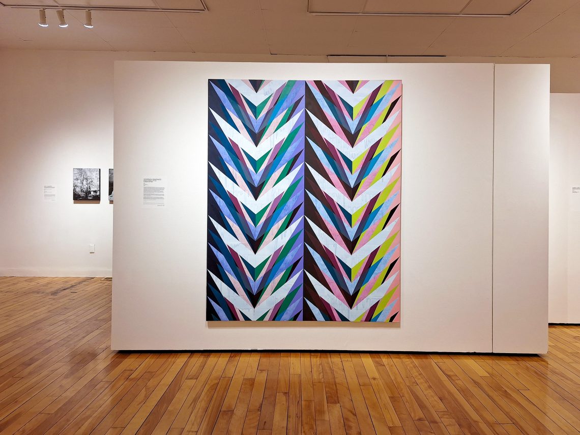 Hannah Barnes, "Stereo," 2021. Oil and watercolor on linen, 80 x 64 in. Part of "(T)HERE BUT NOT: The 2024 University of Southern Maine Art Department Exhibition," Installation view, 2024. University of Southern Maine Art Gallery.