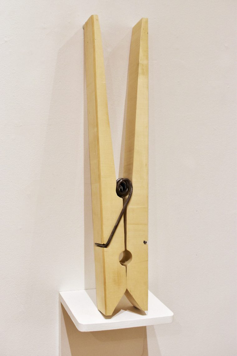 Katie Clark, “Clothespin”, 2023, Wood and Steel, 27 1/2 x 4 in. 
