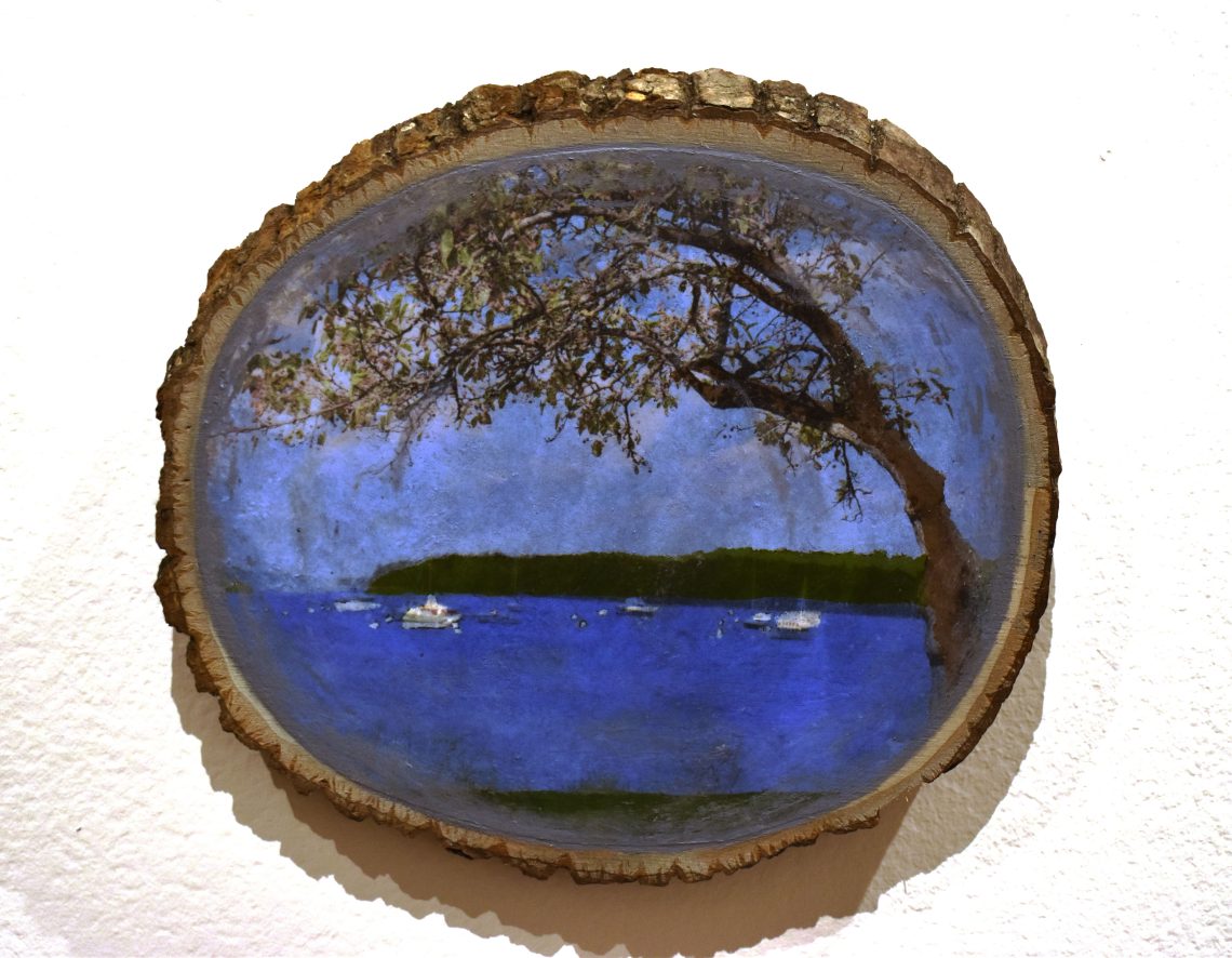 Tabitha Burgess, Collective Memories 2, 2024, Image Transfer and Acrylic Paint on Pine Wood Slice, 9 x 12 x ¾ in.