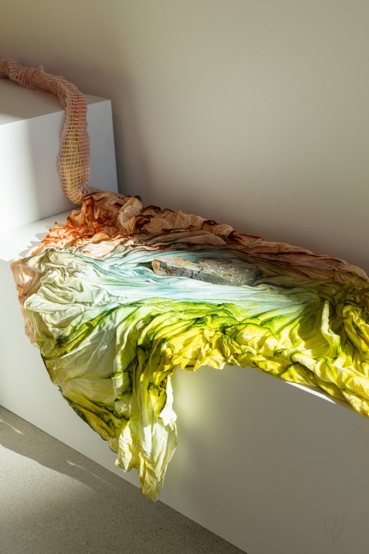 Samantha Jones, "Desideration of Stones" (detail), 2026. Stone, hand painted silk velvet; dimensions variable. Part of "Of Sibyls and Source: Ranges and Ruptures," 2026. Crewe Center for the Arts at the University of Southern Maine. Photo: Marion Earley.