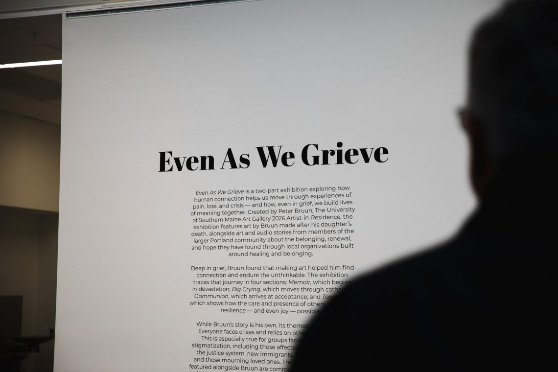 Image of wall text associated with the "Even As We Grieve" exhibition by University of Southern Maine Artist-in-Residence, Peter Bruun. 2026, University of Southern Maine Crewe Center for the Arts.
