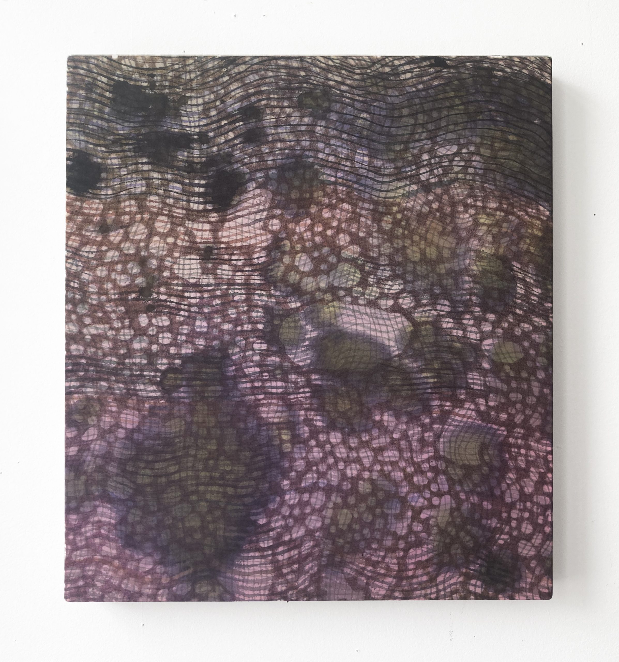 An abstract image of bubbles in greens, purples, and greys.