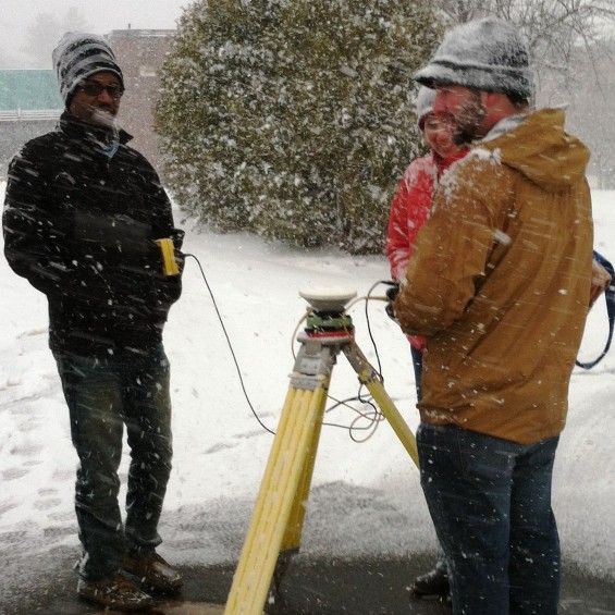 Students taking measurements in the winter