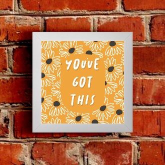 Framed sign on a brick wall that says "You've got this"