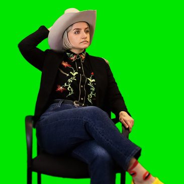 Photo of Janna Ahrndt in cowboy hat.