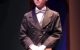 Wadsworth (Atticus Watson) holds his secrets close to the vest in Clue: On Stage