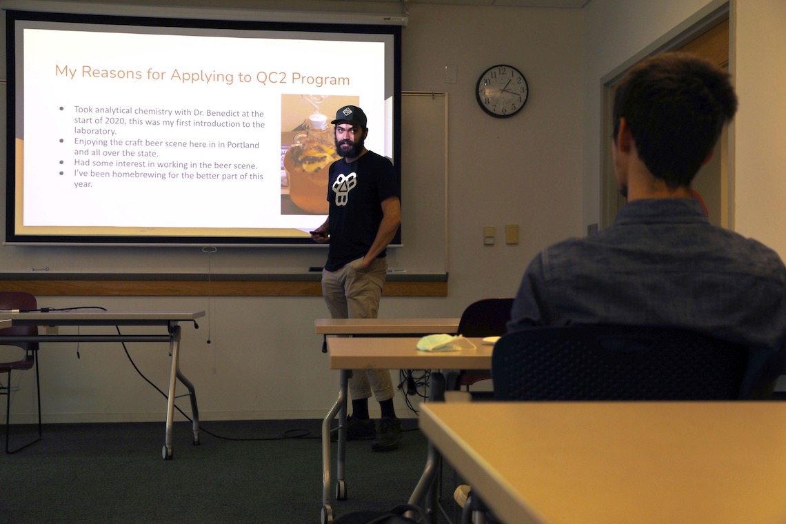 QC2 Lab intern Bryant Hall delivers a presentation about his work at Bissell Brothers Brewing.