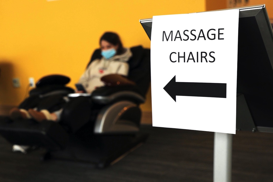 A row of massage chairs in the Abromson Center helped students unwind during Destress Fest.