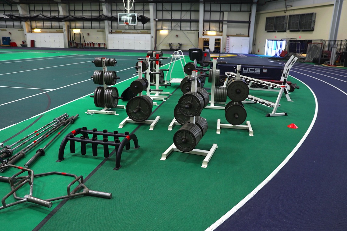 While awaiting the arrival of new fitness equipment at the Costello Complex, the old equipment remained in use along the edges of the indoor track.