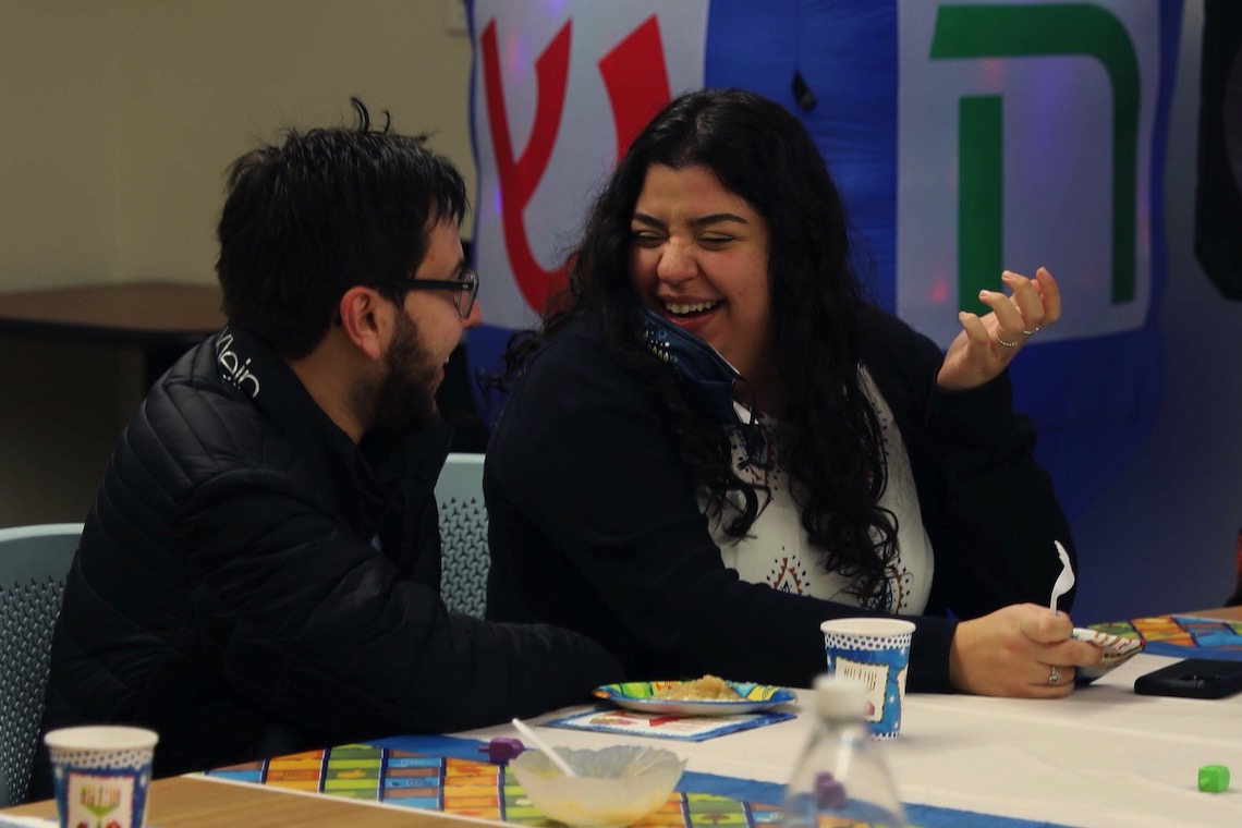 The Hanukkah party brought together students from USM, UNE, SMCC, and MECA&D.