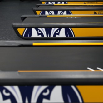 In supplying USM with all new fitness equipment, the Matrix company customized its products with the Husky logo.