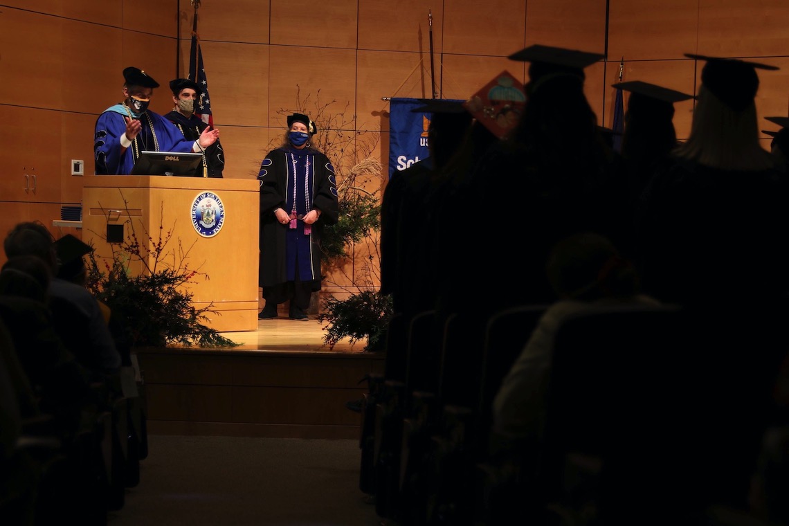 President Glenn Cummings congratulates Nursing program graduates.