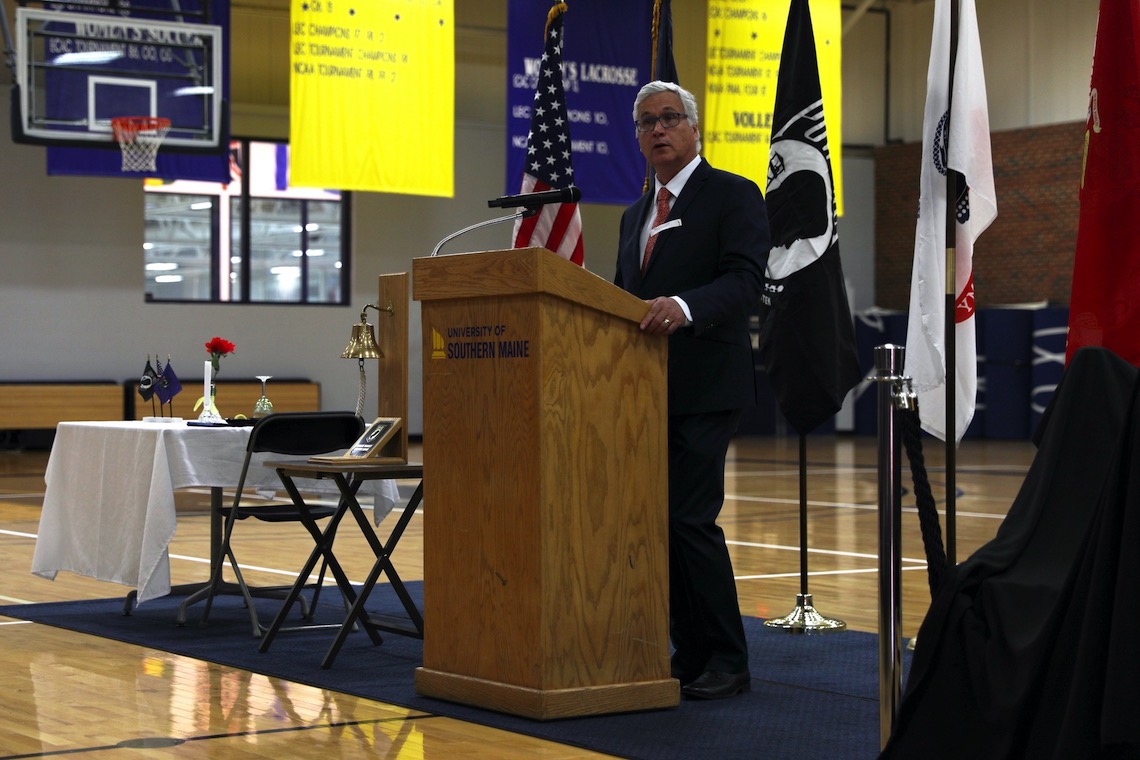 UMS Vice Chancellor of Academic Affairs Robert Placido speaks about his military ties at the unveiling of the POW/MIA Chair of Honor.