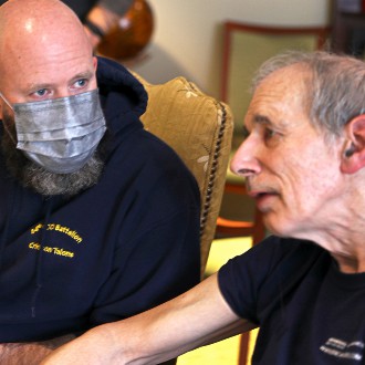 Stuart Harris talks to a veteran at Scarborough Terrace