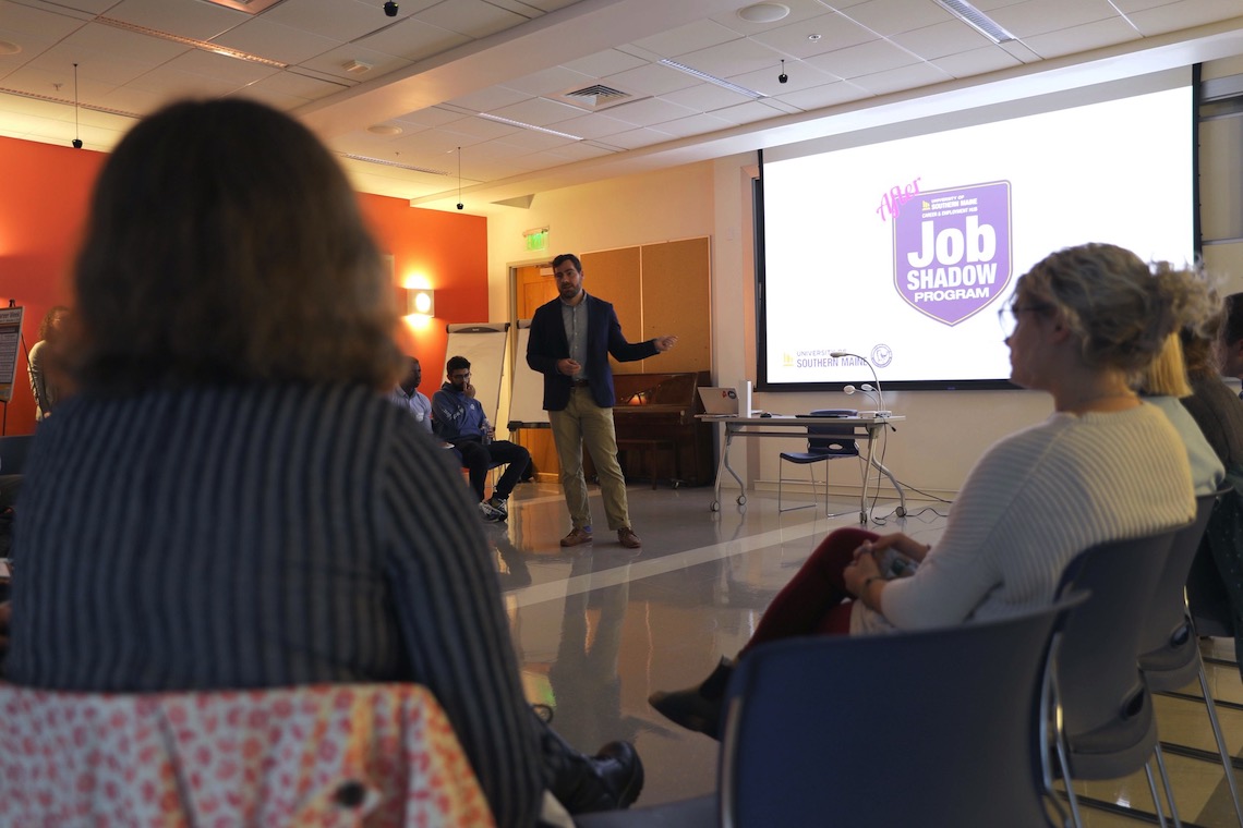 Andy Osheroff, Director of the Career and Employment Hub, asks participants in the Job Shadow Program to share feedback about their experiences with area businesses.