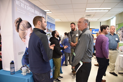 People networking at a job fair.
