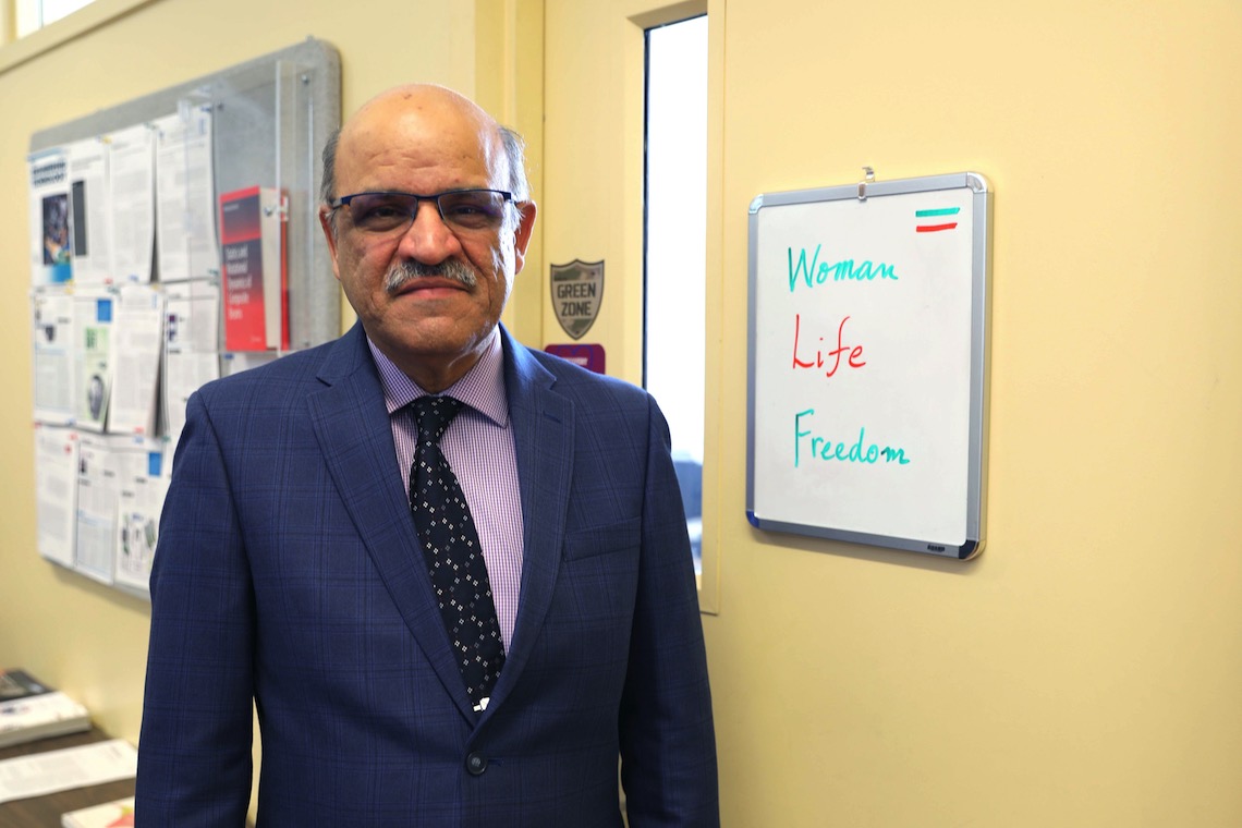 Written on the door to Dr. Mehrdaad Ghorashi's office is the slogan of Iranian protesters, "Woman, Life, Freedom."