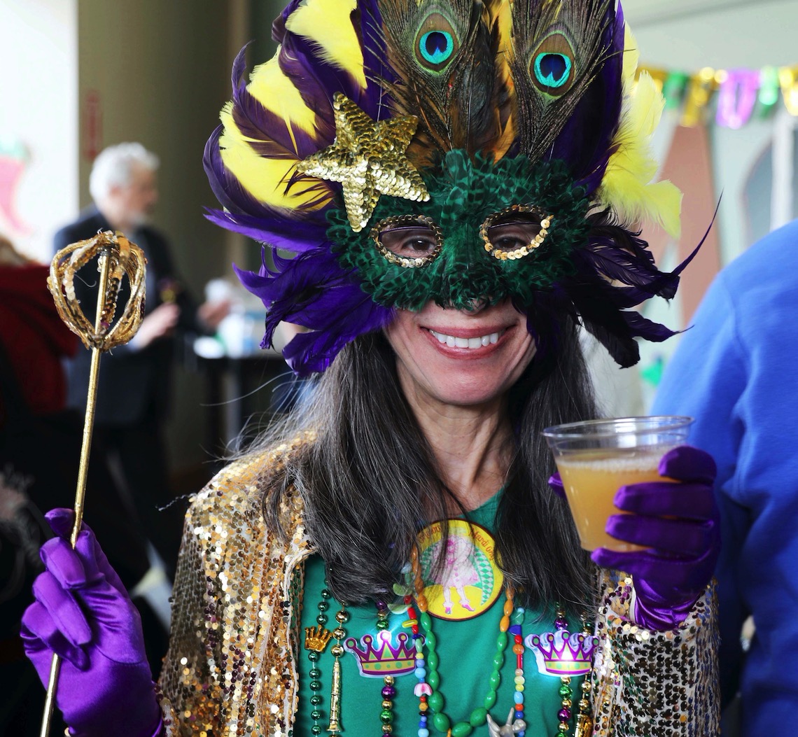 A reveler arrived in costume to WMPG's 2023 Mardi Gras party.