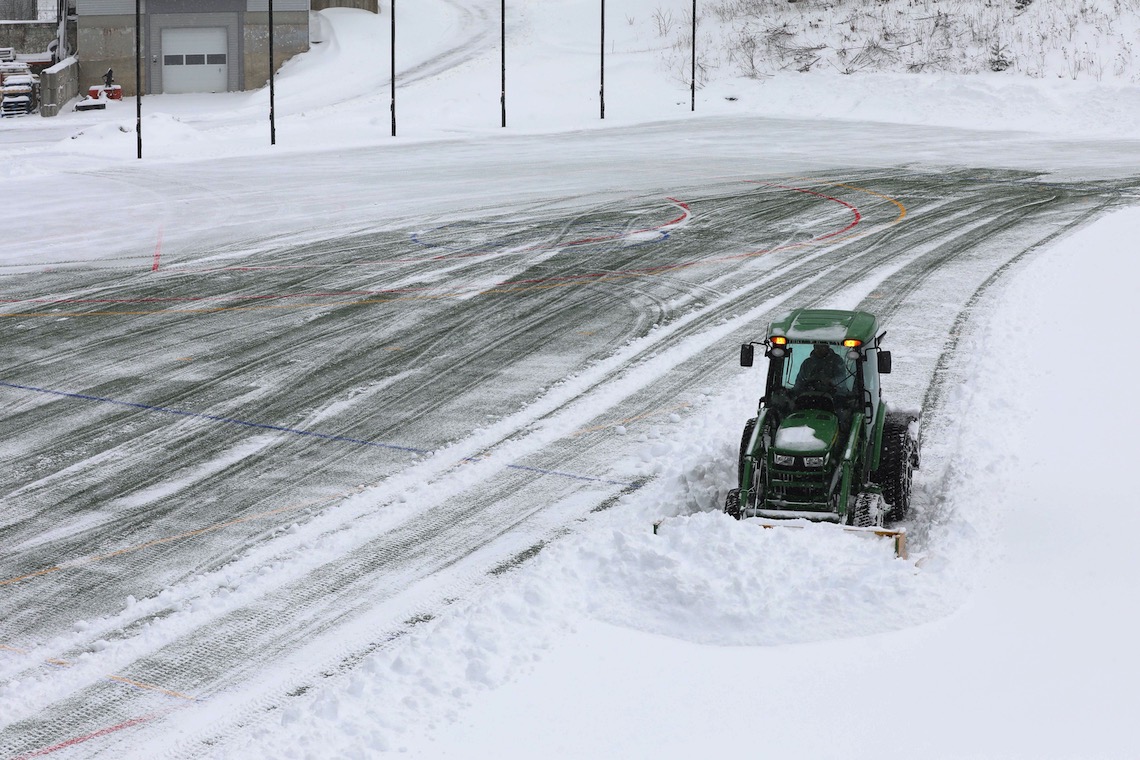 A plow driver might work for eight hours to clear a snowfall of five to eight inches from the full 93,000 square feet of Hannaford Field.