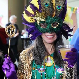 WMPG disc jockey Eydie May dressed in full costume for the radio station's annual Mardi Gras party.