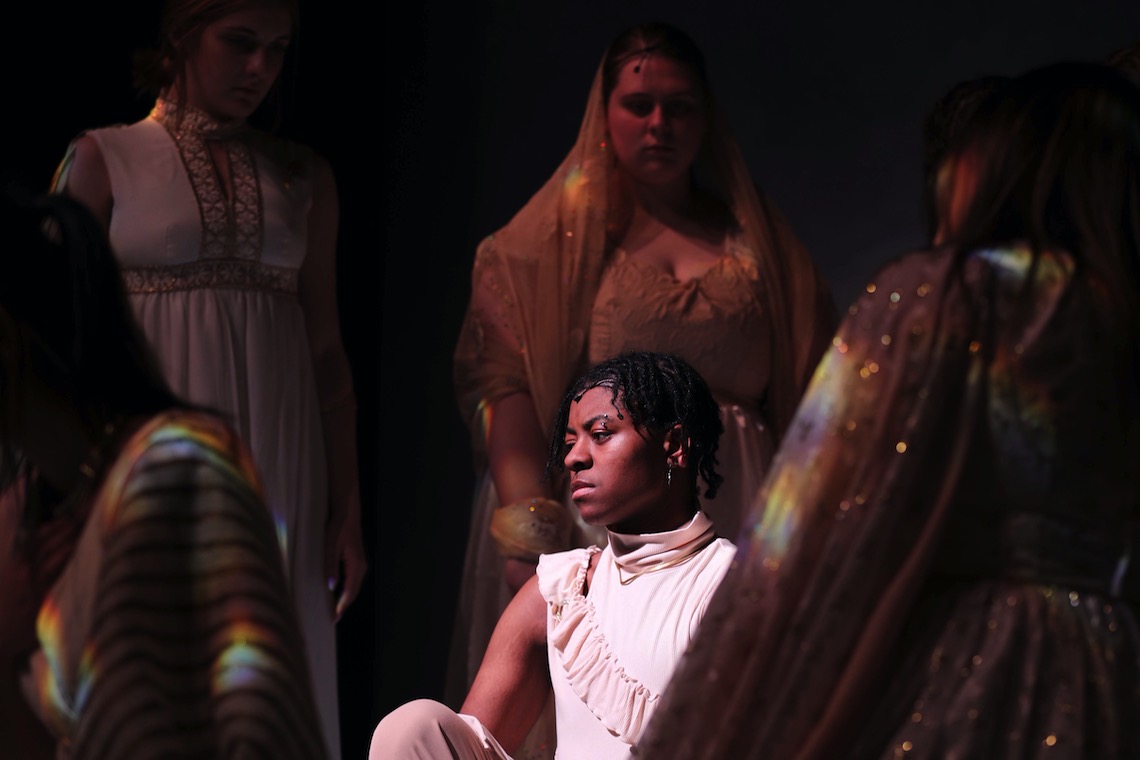 A shadowy wedding party surrounds Orpheus (Lucious Finston-Fox) in a scene from "Eurydice Rising."