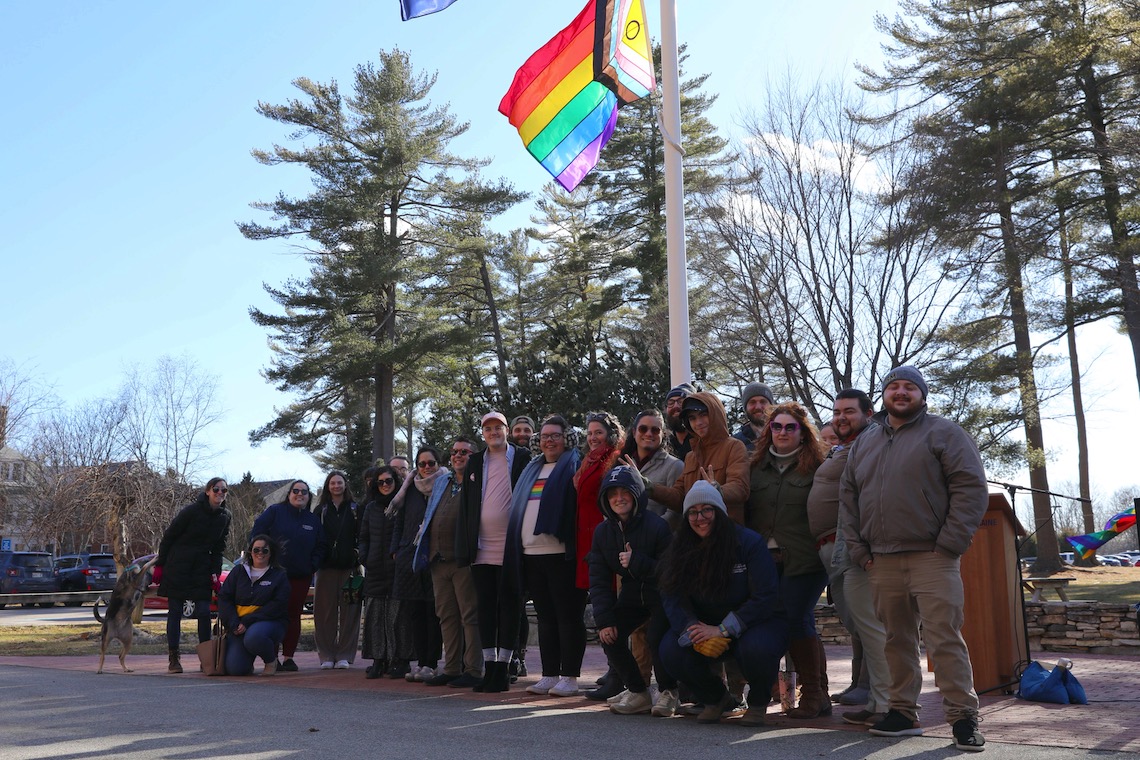 Following the ceremony to raise the Intersex-Inclusive Progress Pride Flag, everyone in attendance gathered around the flagpole in solidarity.