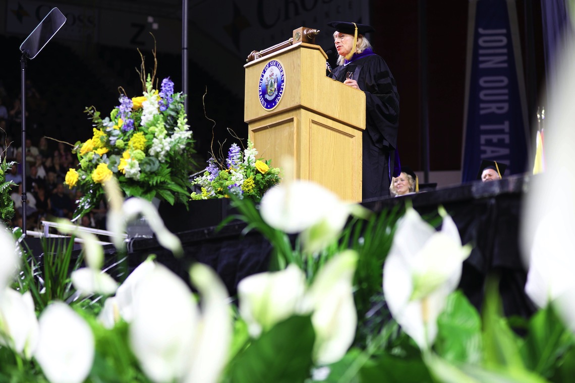 Gov. Janet Mills speaks to graduates, including her grandson, at the 2023 Commencement.