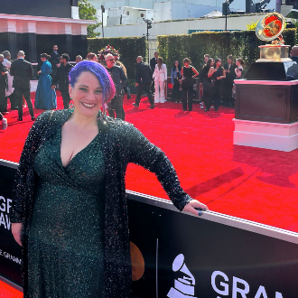 Alexandra Dietrich enjoys her red carpet moment at the Grammy Awards, as part of the team that recorded the opera "X: The Life and Times of Malcolm X."