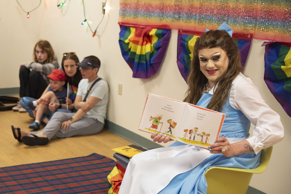 A drag performer at Gorham Pride entertained kids and their parents by reading from a storybook while dressed as Belle from Disney's "Beauty and the Beast."