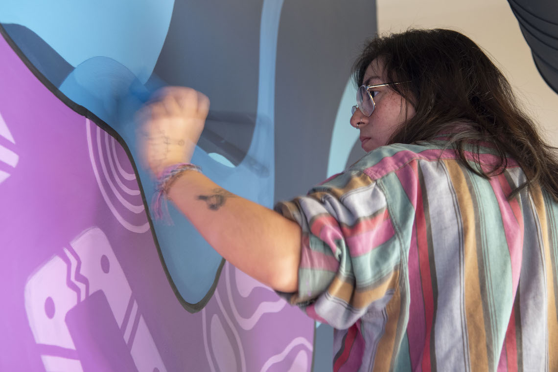 With the deadline approaching to finish her mural at the McGoldrick Center, Marissa Joly was a blur of artistic activity.