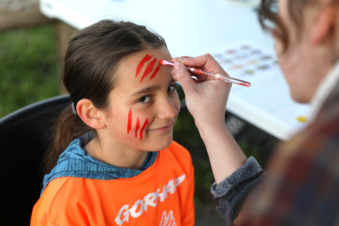 The Student Theatre Artist Group applied face paint to participants in the Zombie Run.