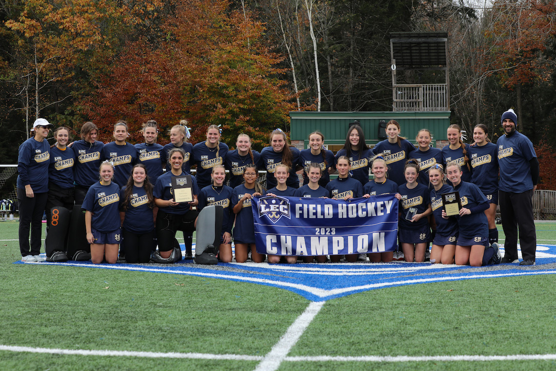 The field hockey team poses for a group photo to commemorate winning the 2023 LEC championship.