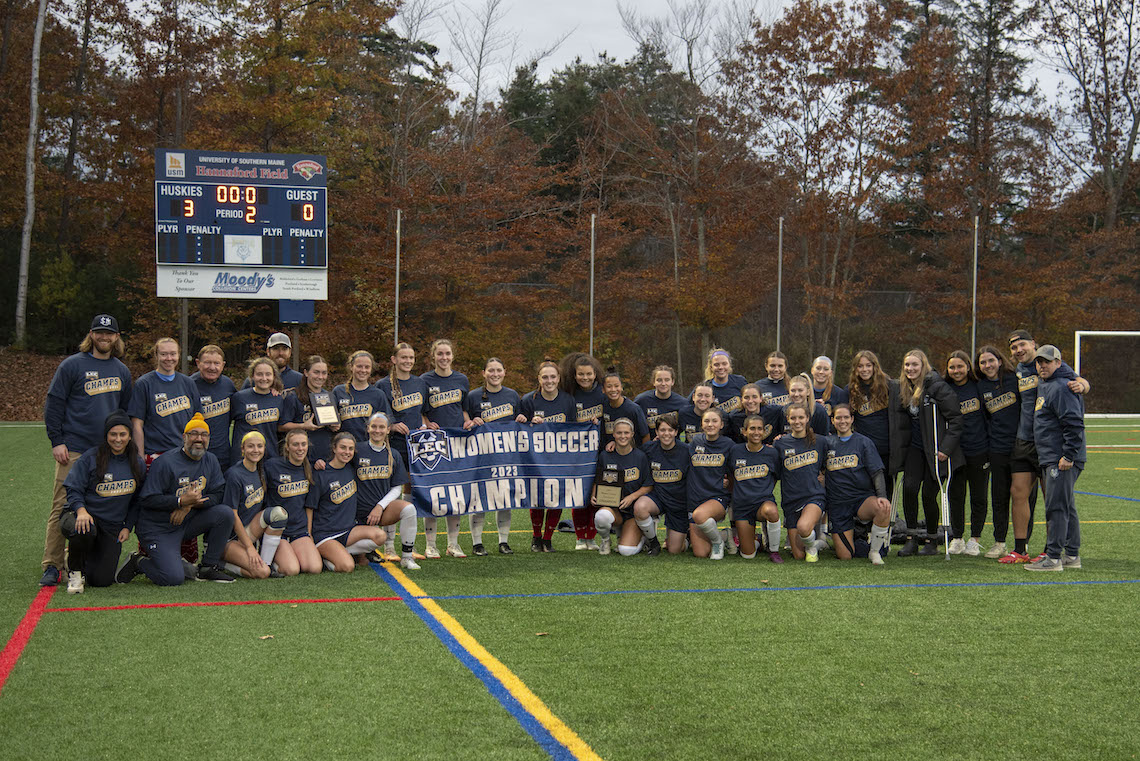 The women's soccer team poses for a group photo to commemorate winning the 2023 LEC championship.