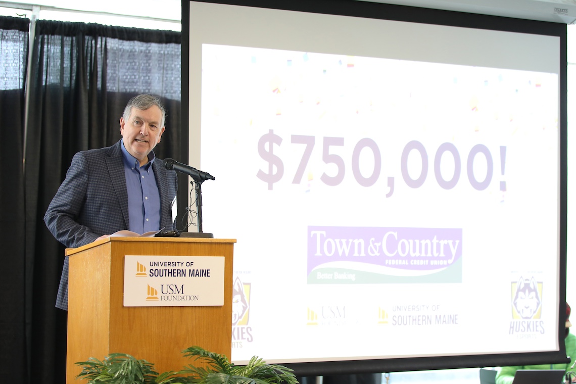 Town & Country Federal Credit Union Vice President of Marketing Jon Paradise announces a $750,000 gift to fund a new esports arena.