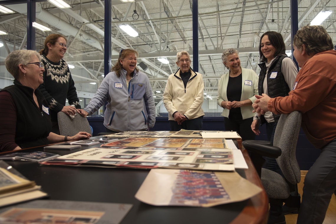Archival photos helped jog the memories of former players who attended a reception to celebration Paula Hodgdon's induction into the Maine Field Hockey Association Hall of Fame.