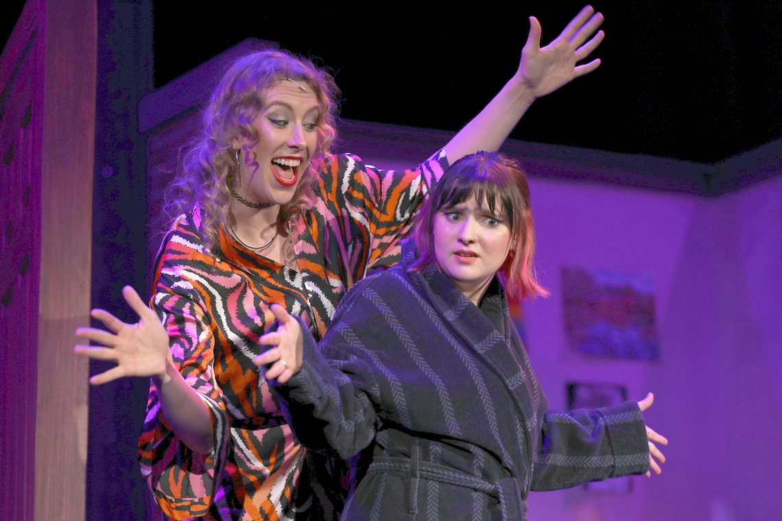 Kallie Brown (left) gives Emma Hall a lesson in Zazz in the spring musical "The Prom."