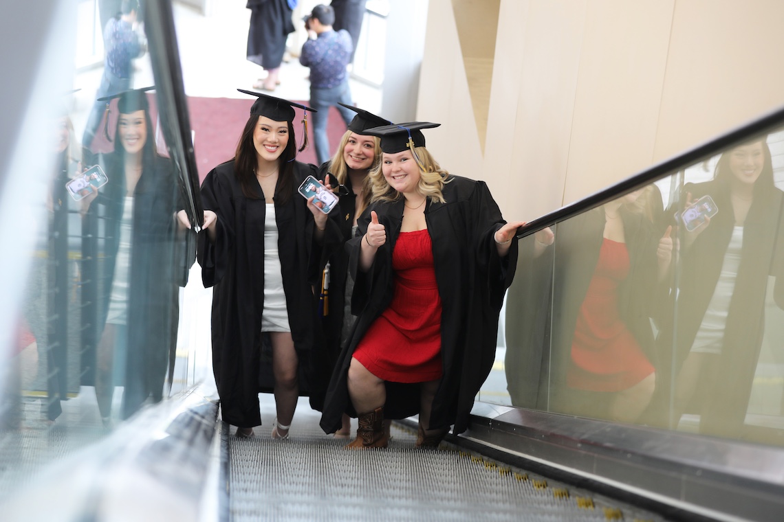 Up the escalator into the Cross Insurance Arena for the 2024 Commencement ceremony.