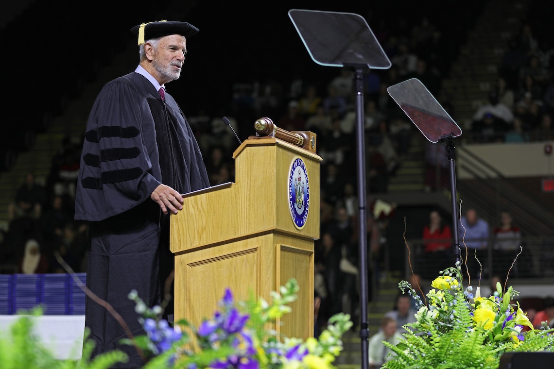 UMaine System Board of Trustees member Roger Katz speaks at the 2024 Commencement ceremony.