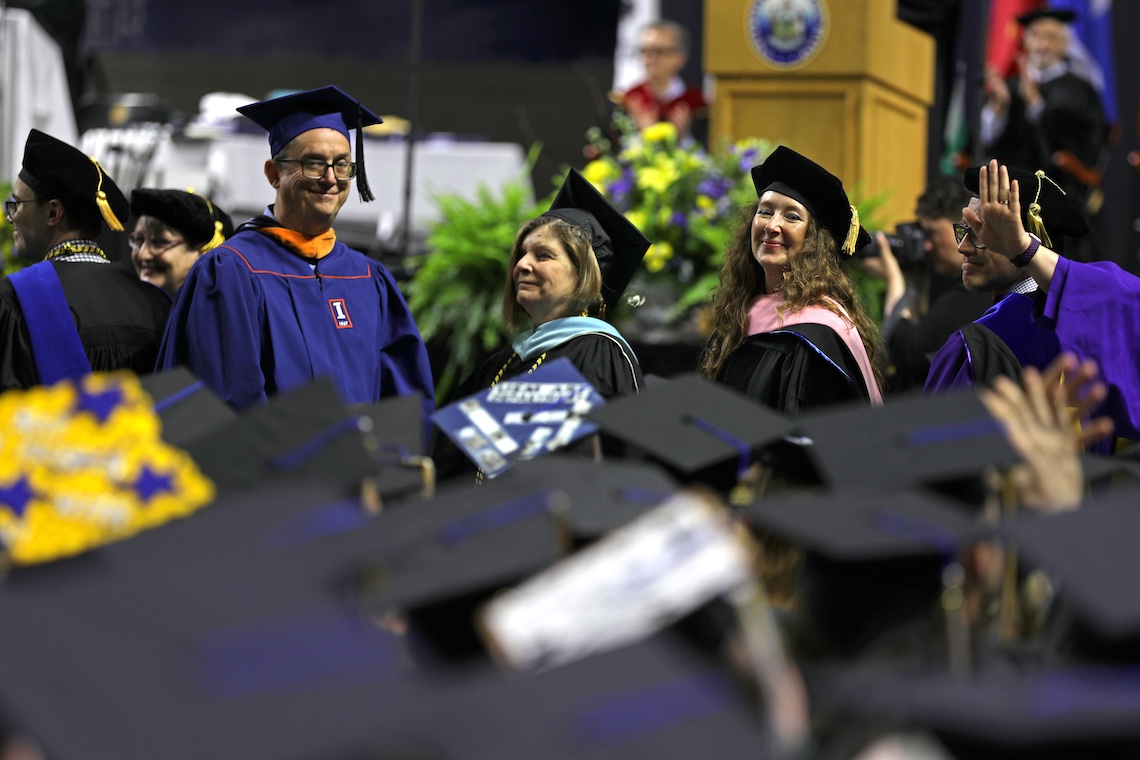 Faculty receives a round of applause at the 2024 Commencement ceremony.