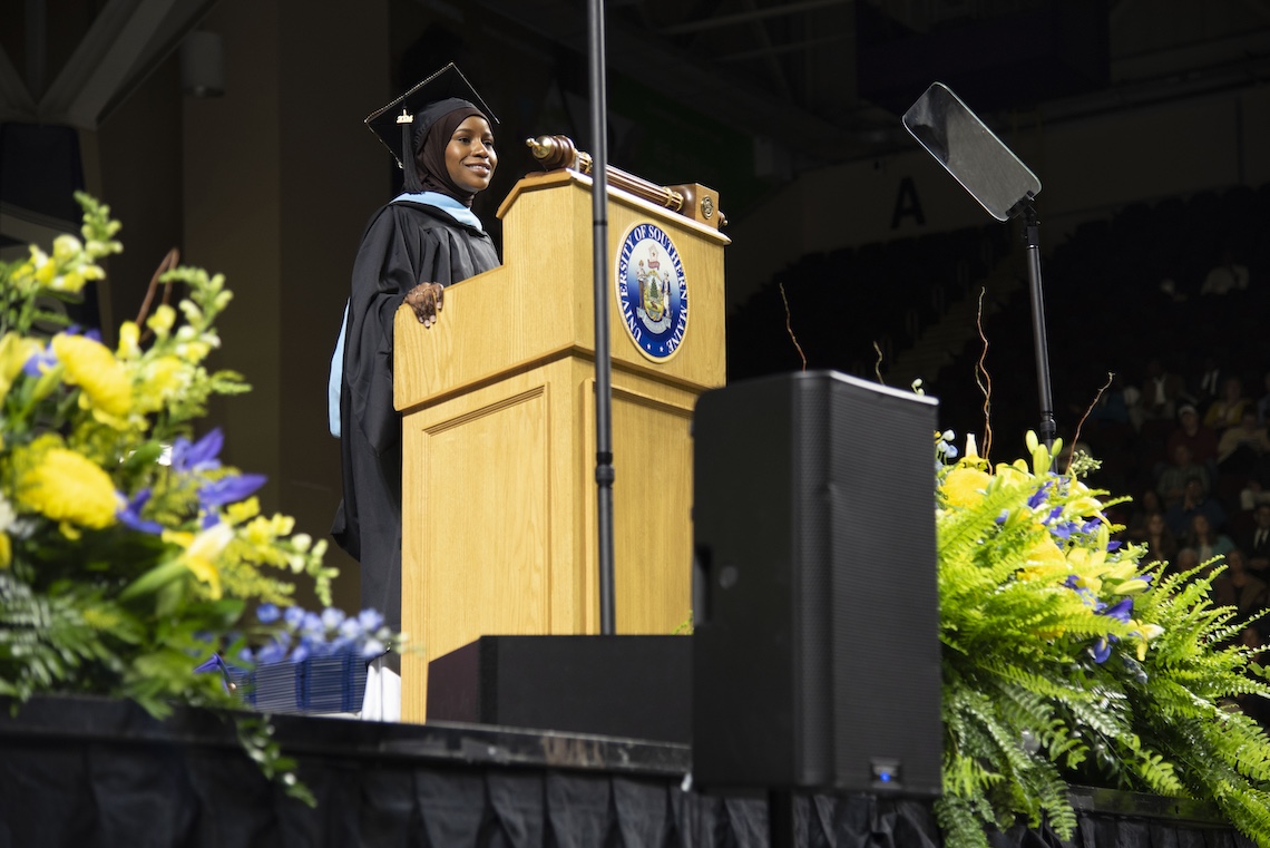 Student speaker Hamido Hassan shared her educational journey at the 2024 Commencement ceremony.