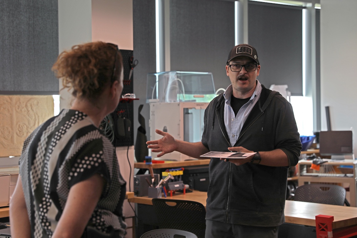 MIST Lead Technician Drew Sfirri explains the steps he took to design a locking device for the body-worn cameras used by Campus Police.