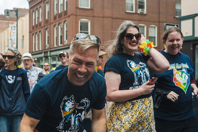 USM employees enjoying a pride parade