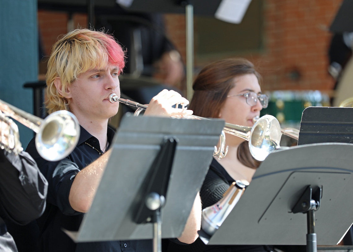 The trumpet section of the Osher Wind Ensemble got a workout from all the marches in the annual homecoming concert.