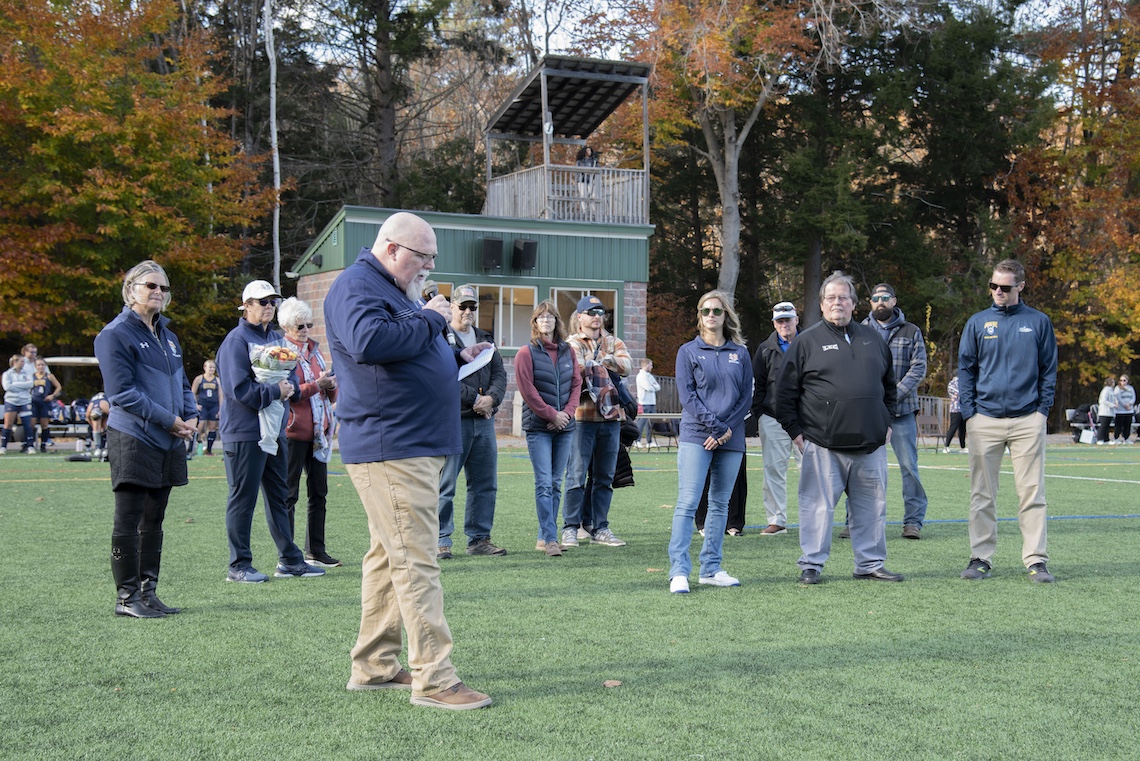 Interim Athletics Director Michael Keller enumerates the many accomplishments of Peyton Dostie Collins that earned her entry into the LEC Hall of Fame.