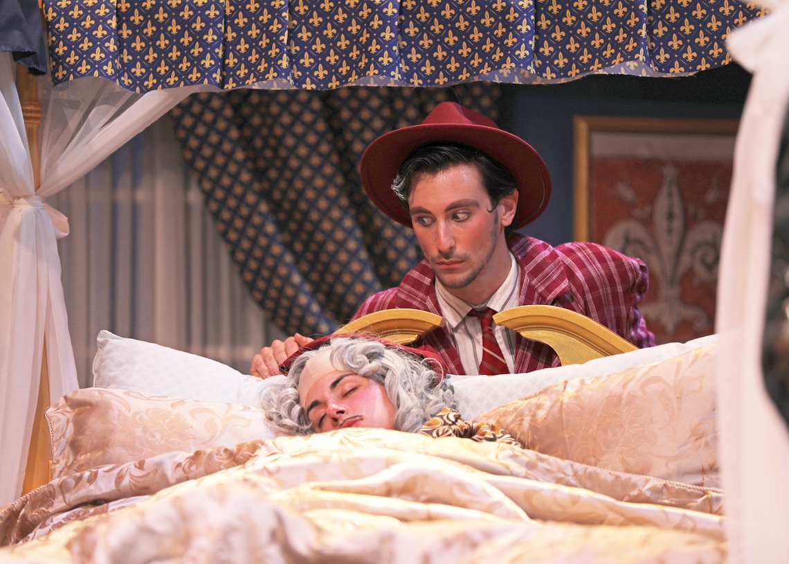 In a new production of Puccini's "Gianni Schicchi," the title character (Nick Sutton) looms over the dead body of Buoso Donati (Caroline Woods).