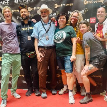 Director Tom Bell stands center, to the right of him is Producer Annella Linton. Group poses for red carpet photo at Love and Hope International Film Festival in Barcelona.