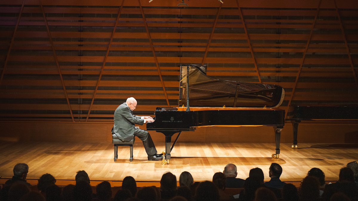 Dr. Steven Smith plays the piano at inaugural concert in Crewe Center