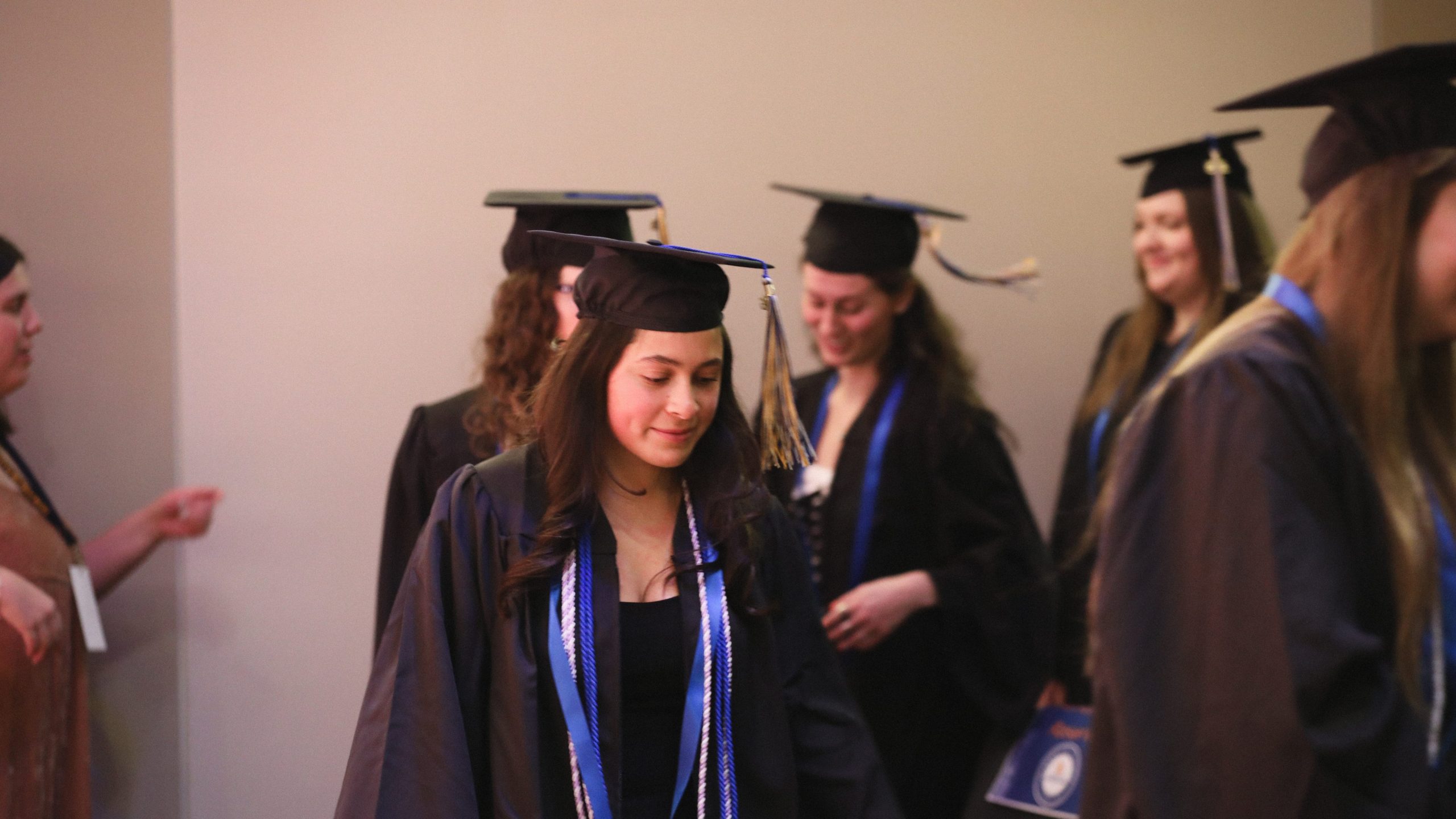 USM Nursing grads exit the auditorium in a line
