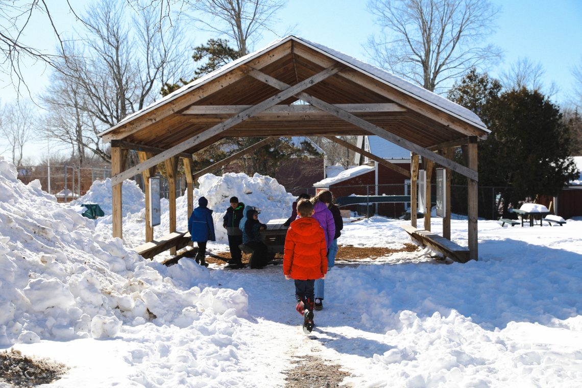 Fourth-grade students head to an outdoor classroom for a lesson at Wiscasset Elementary School.